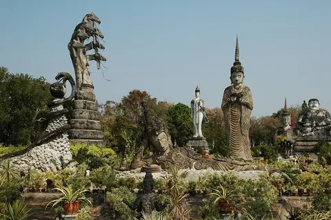 The naga-sheltered Buddha and sculptures at Sala Keoku